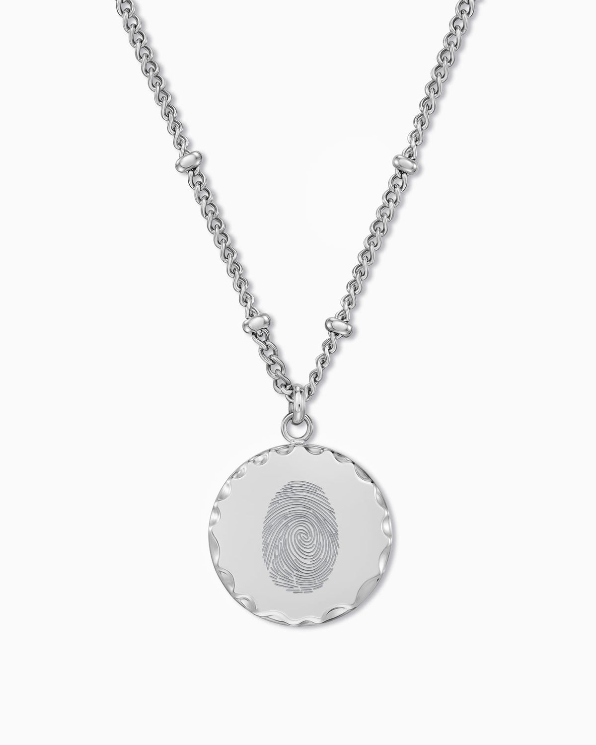 Ketting met gravureplaatjes in de vorm van vingerafdrukken, rond